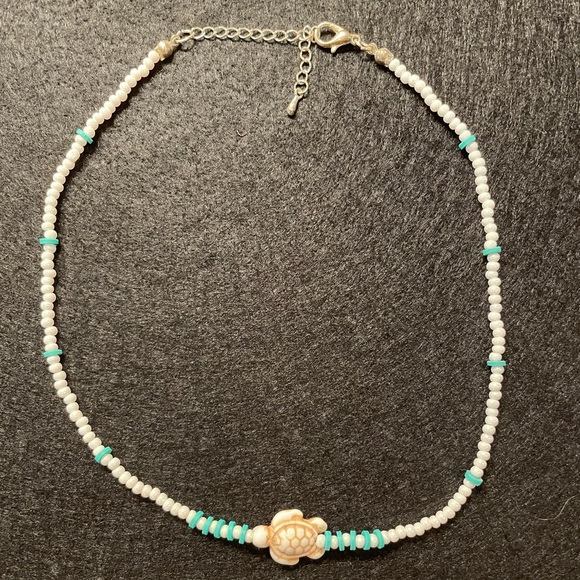 Cute beach shell necklace with turtle. - Picture 1 of 1